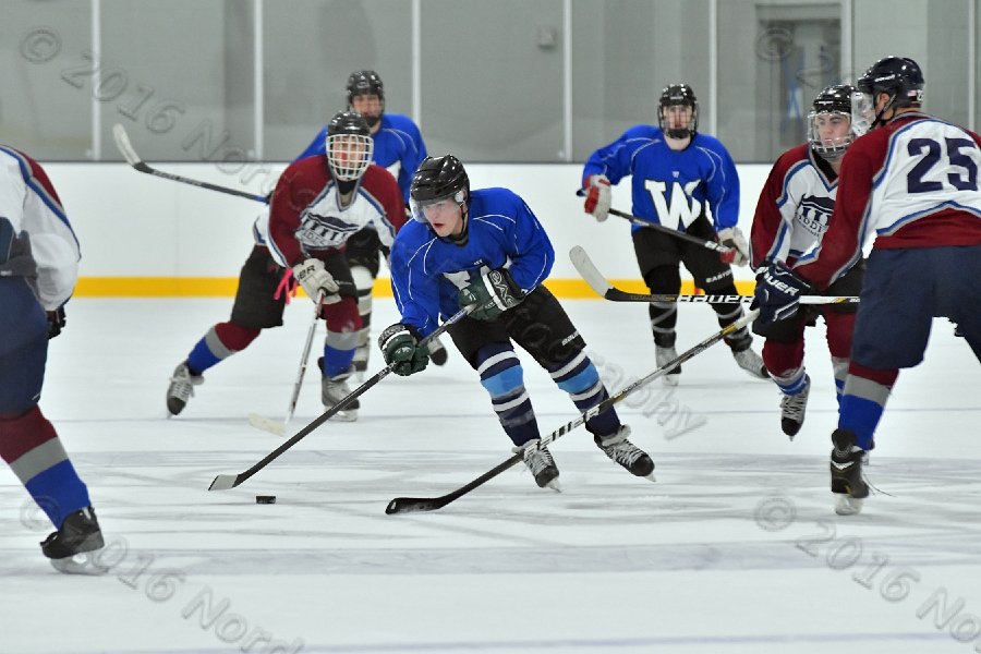 Wheaton College Men\'s Ice Hockey vs Middlesex Community College. - Photo By: KEITH NORDSTROM